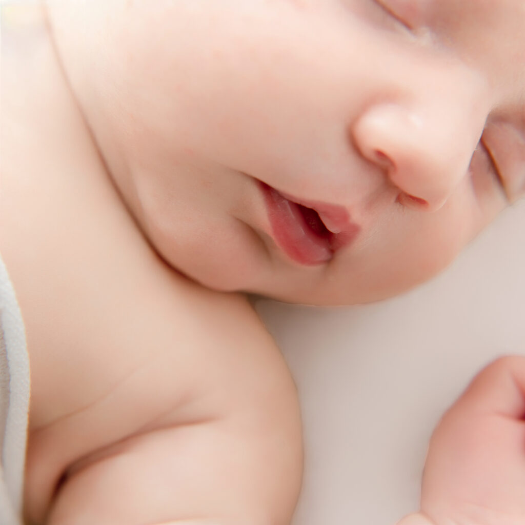 Newborn detail photography of nose and lips